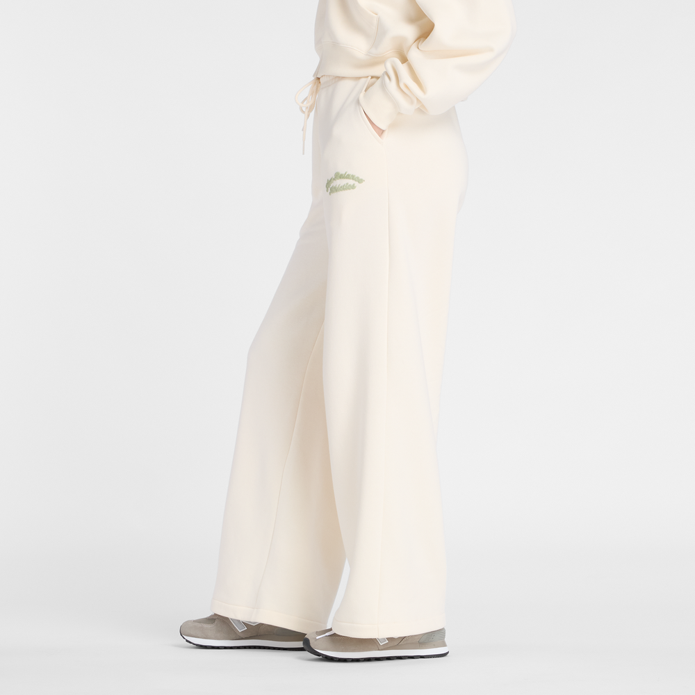 Spodnie damskie New Balance WP53902PEF – beżowe