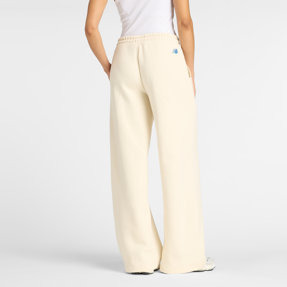 Spodnie damskie New Balance WP53903LIN – beżowe
