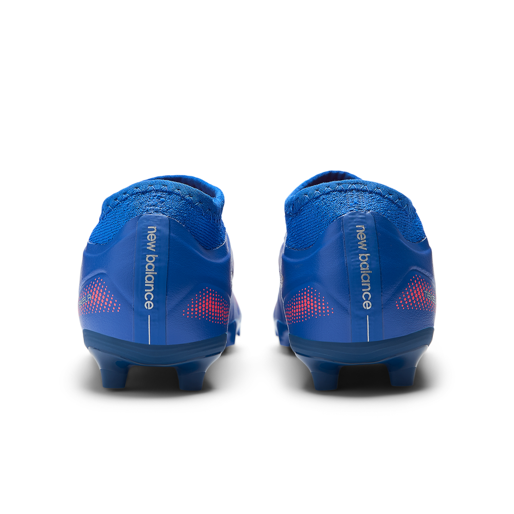Korki dziecięce New Balance TEKELA TEAM LOW JNR FG SJT3FMP5 - niebieskie