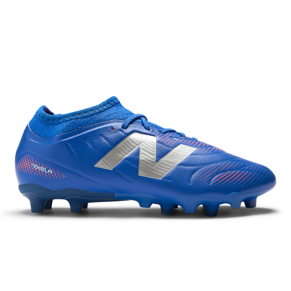 Korki dziecięce New Balance TEKELA TEAM LOW JNR FG SJT3FMP5 - niebieskie