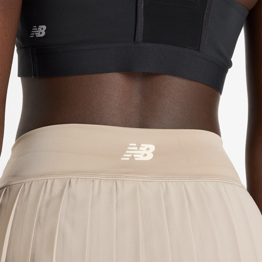 Spódnica damska New Balance WK51402ADS – beżowa