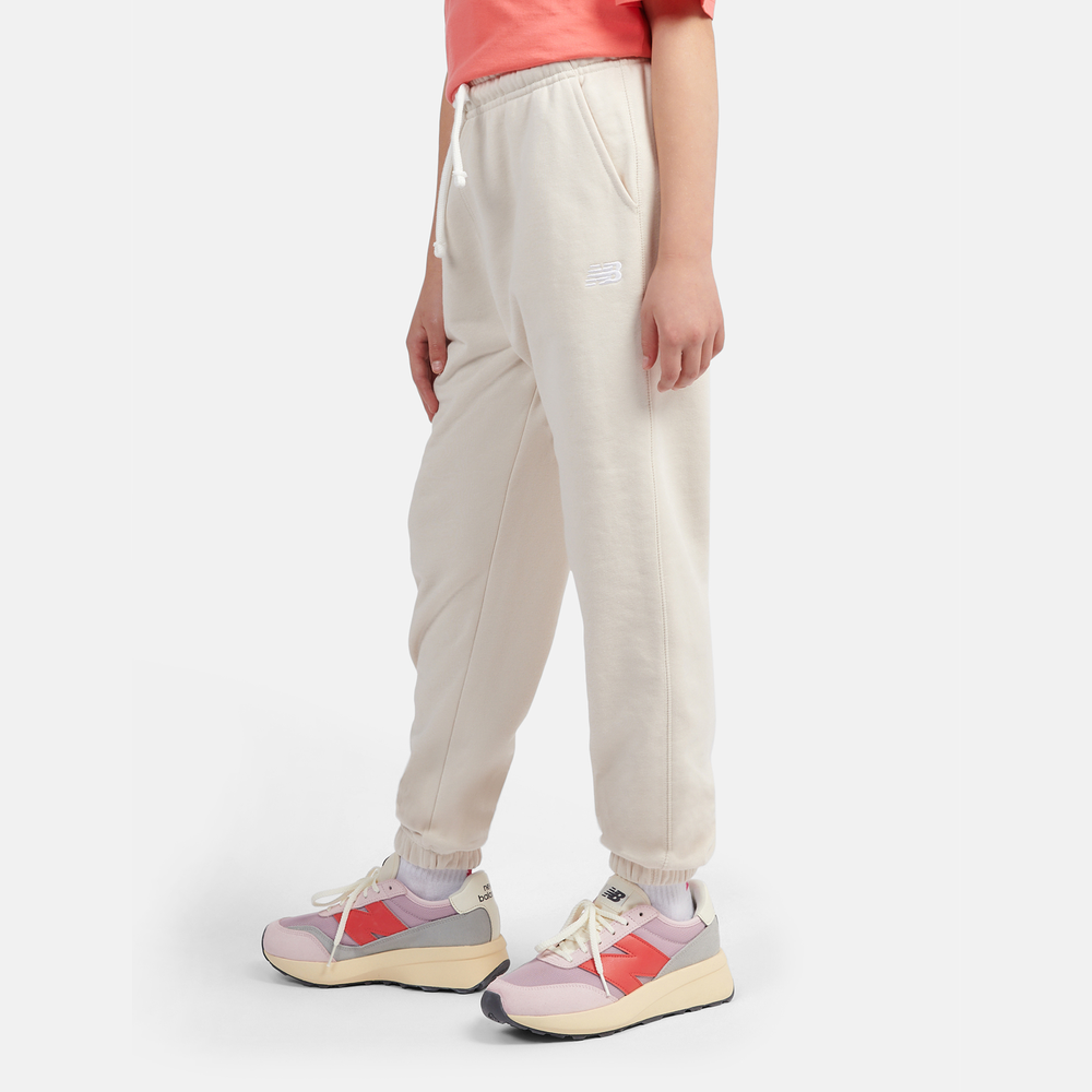 Spodnie dziecięce New Balance LAKG0058LIN – beżowe