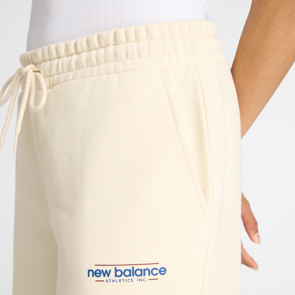 Spodnie damskie New Balance WP53903LIN – beżowe