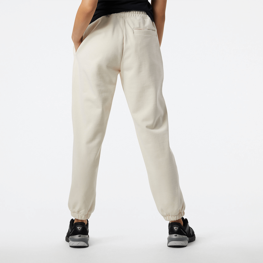 Spodnie damskie New Balance WP23553GIE – beżowe