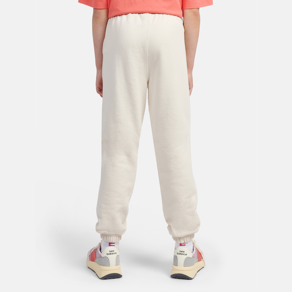 Spodnie dziecięce New Balance LAKG0058LIN – beżowe