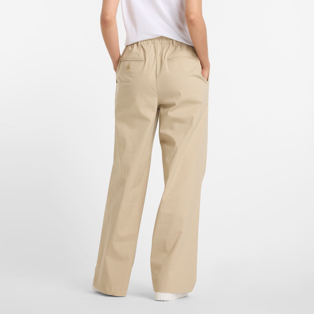 Spodnie damskie New Balance WP51538SOT – beżowe