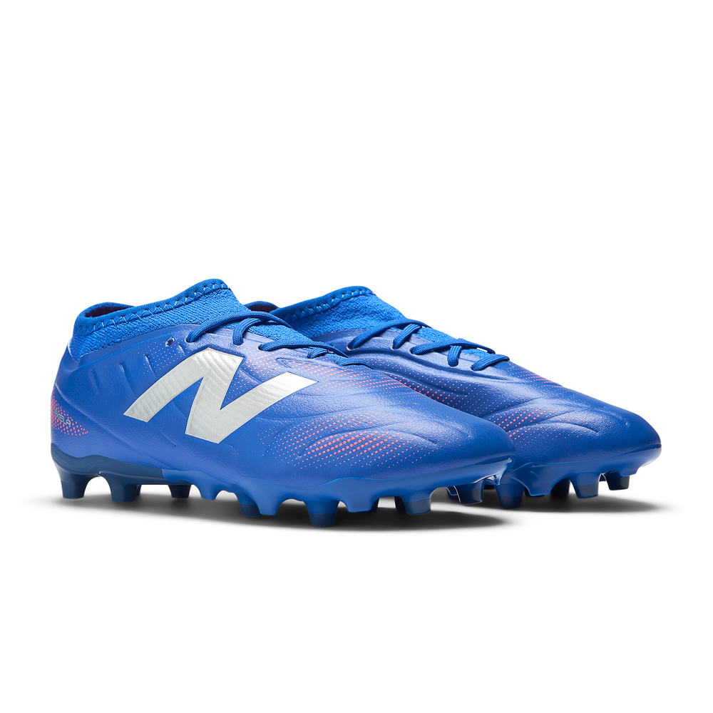 Korki dziecięce New Balance TEKELA TEAM LOW JNR FG SJT3FMP5 - niebieskie