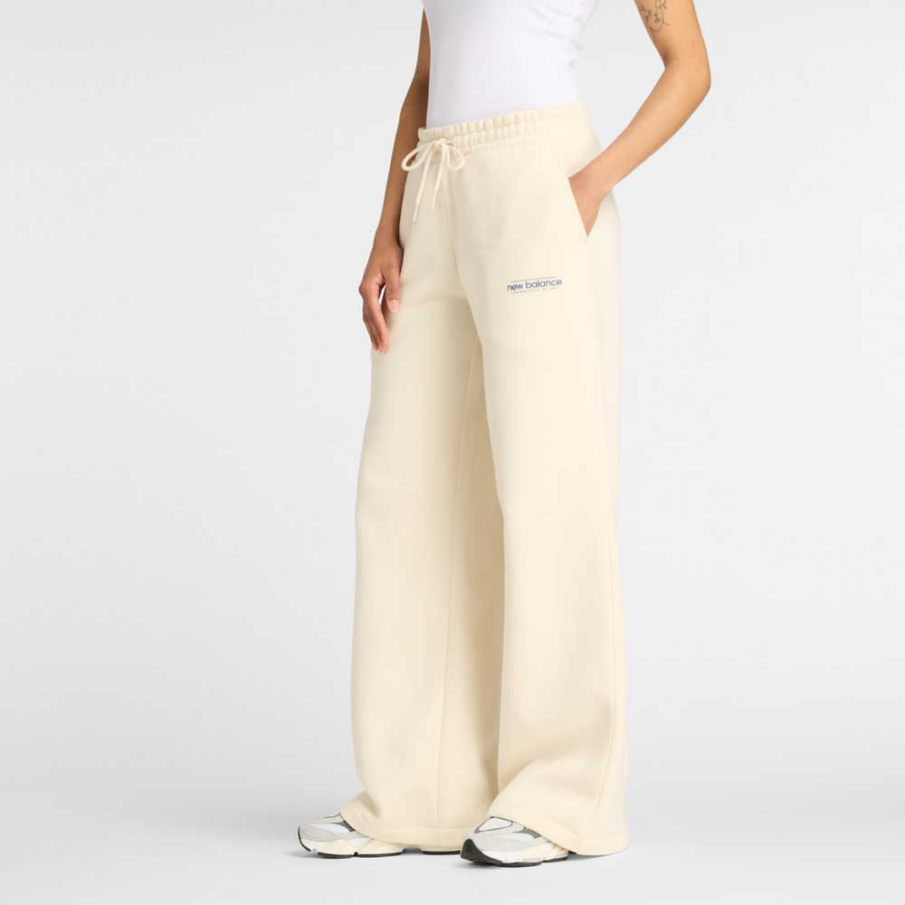 Spodnie damskie New Balance WP53903LIN – beżowe