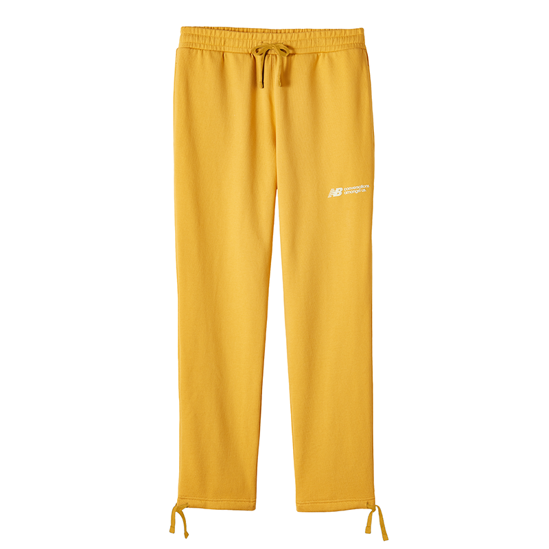Spodnie New Balance MP21922ASE – żółte